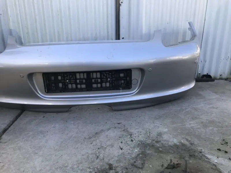 Porsche 987 achterbumper nette staat - grijs Origineel Porsche