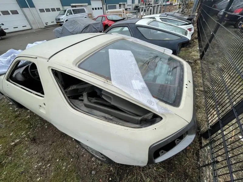 Porsche 928 achterklep - blank - met ruit - 928-944parts